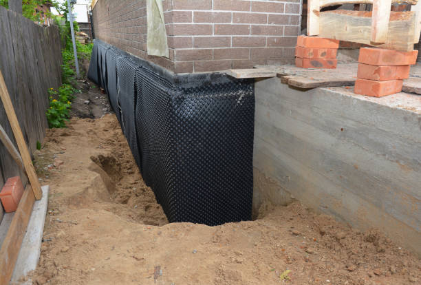 Happy homeowners after waterproofing job in Harrodsburg